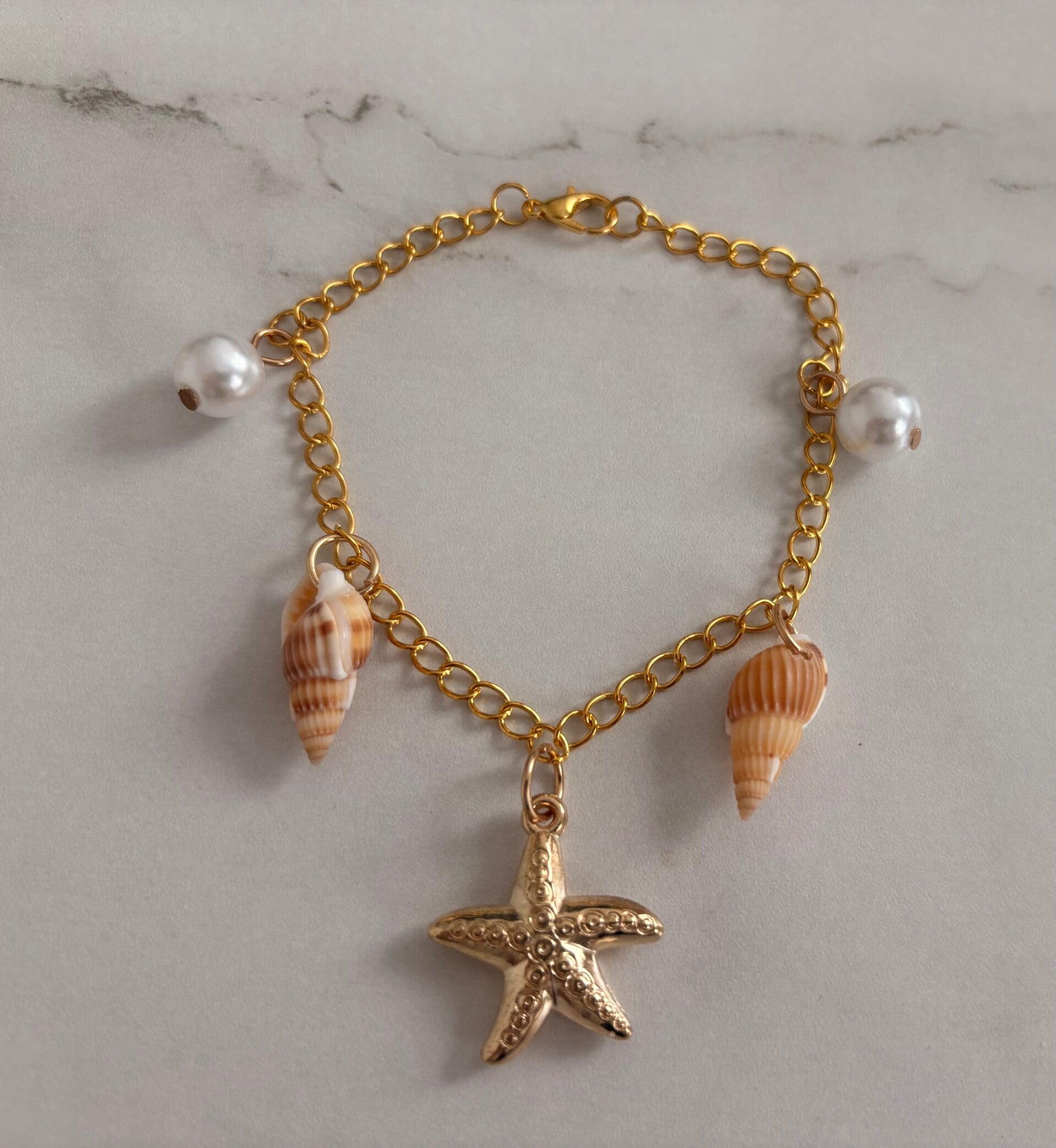 Bracelet marin en acier inoxydable – Perles, coquillages & étoile de mer