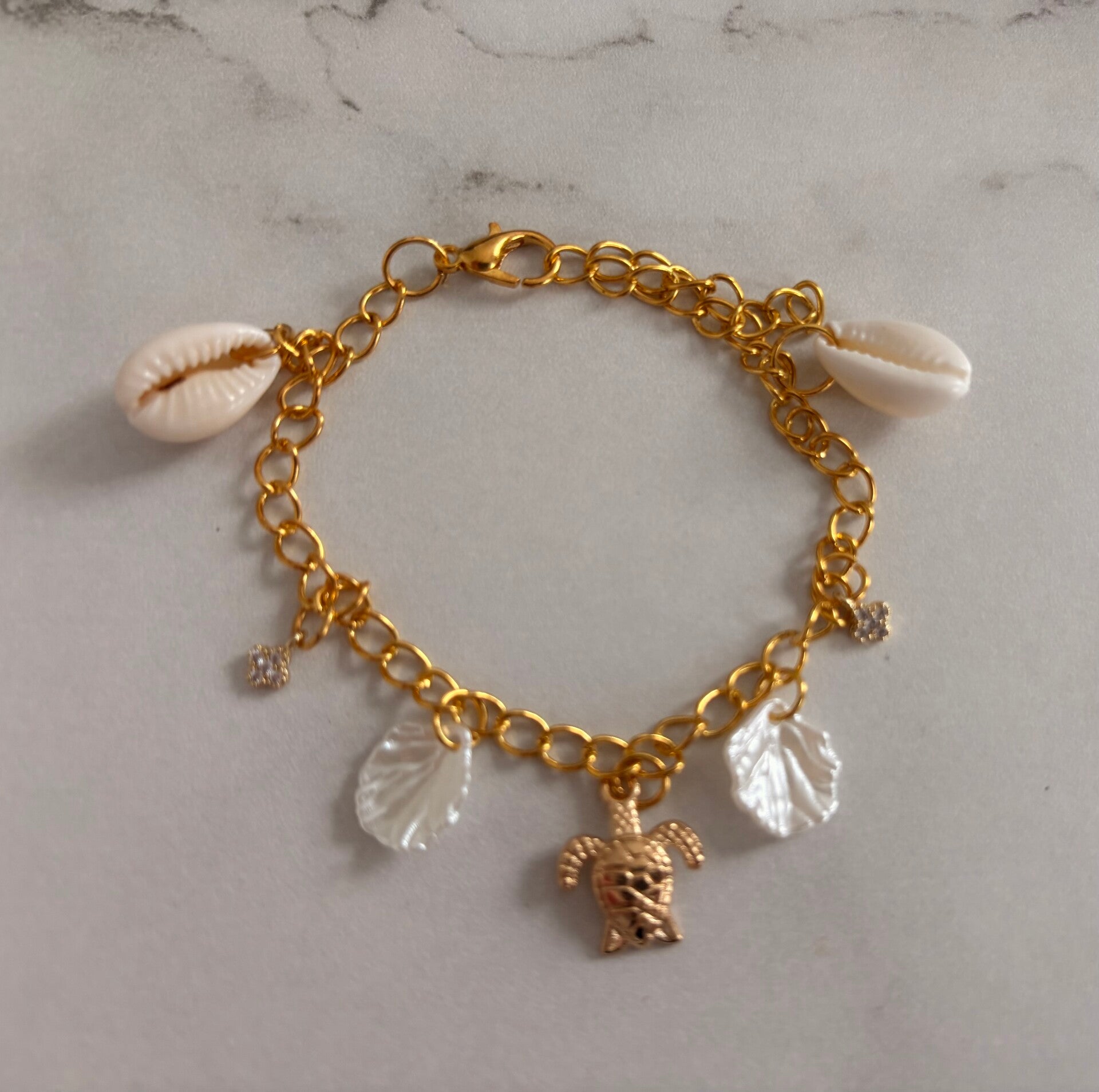 Bracelet marin en acier inoxydable – Coquillages, feuilles & tortue
