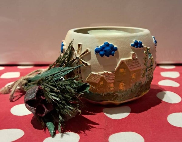 Potje met windmolens.