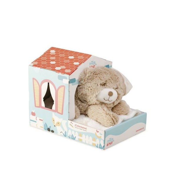 Deken met knuffel in huisje