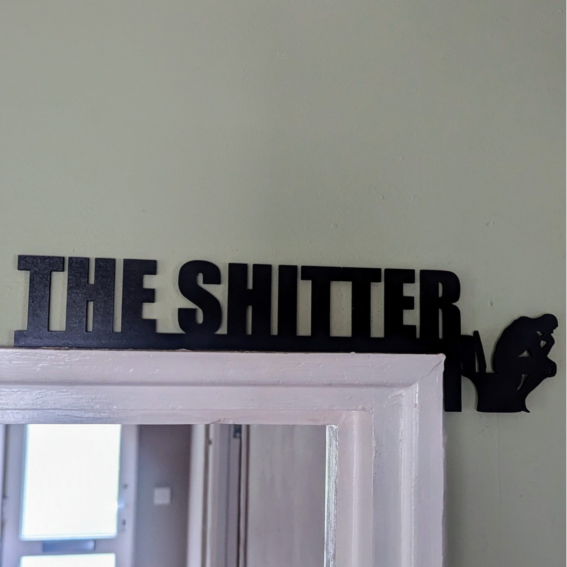 The Shitter Thinking Man Toilet Sign