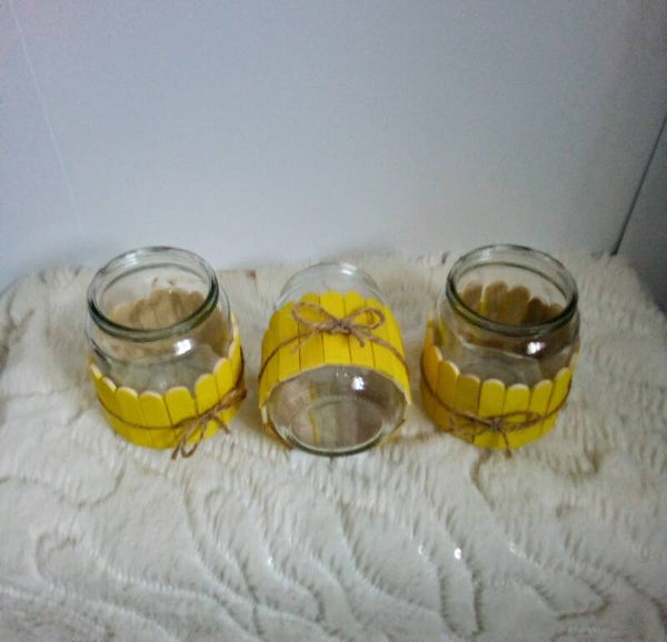 Small glass jars with wooden trim set of three