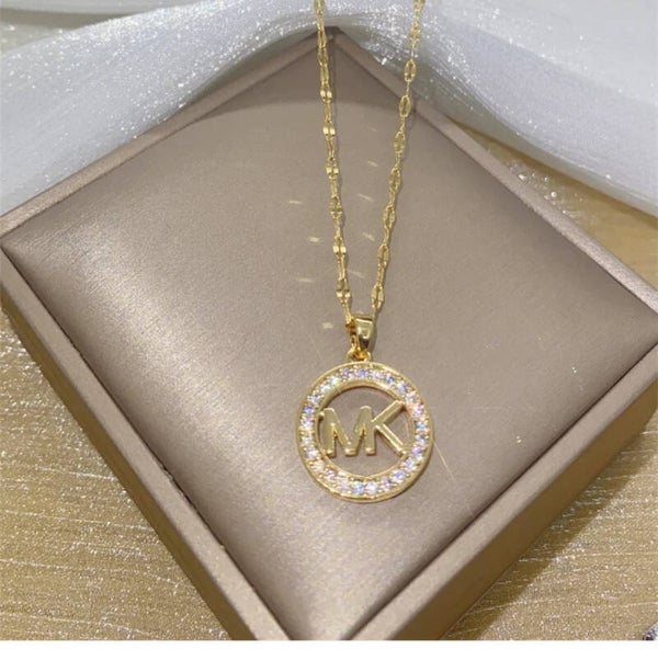 Collier MK doré scintillant