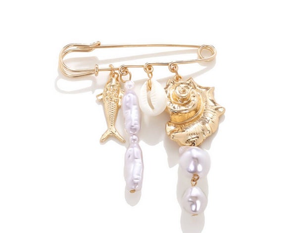 Schelpvormige broche