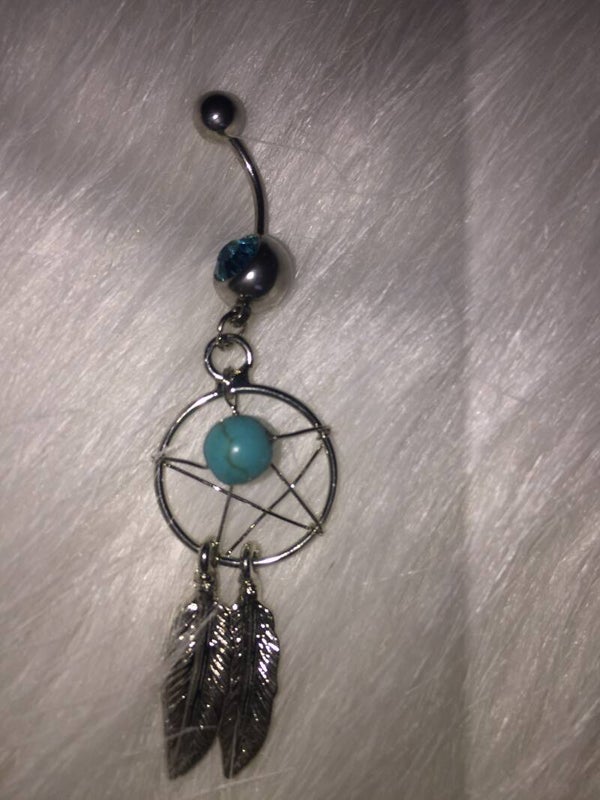 Dromenvanger navel piercing