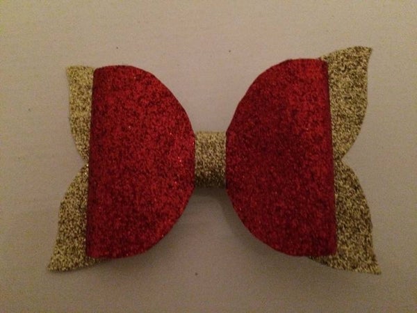 Grote strik met goud en rood