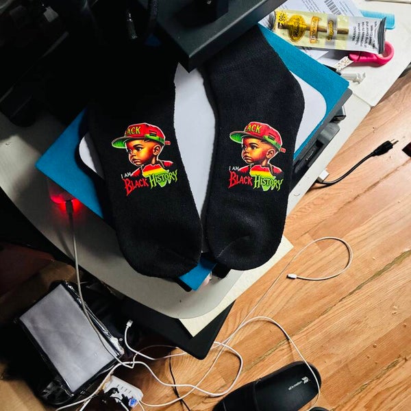 1 pair of black History Month socks