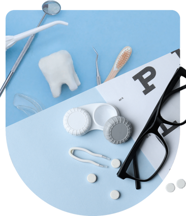 Dental and vision care items including a toothbrush, tooth, contact lens case, glasses, and eye chart