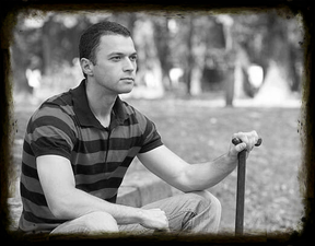 Young man sitting and holding a cane, representing how a Waiver of Premium rider eliminates the stress of paying life insurance premiums during disability without the worry of losing coverage.