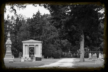 Black and white image of a lonely cemetery, representing the rising costs of funerals