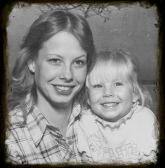 Young single mother and her smiling daughter posing together, representing the 70% of single parents who have no life insurance coverage.