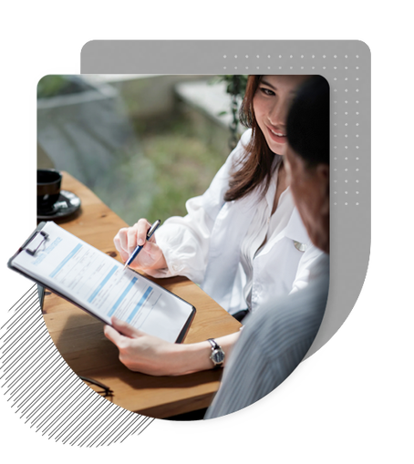 A young couple completing an application for Dental Vision Insurance