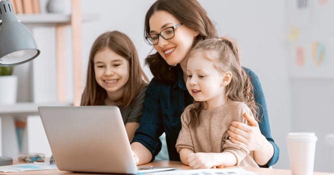 Single mom with two young daughters, represeting the importance of life insurance for single parents