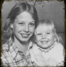 Young single mother with her smiling daughter, representing the 70% of single parents without life insurance coverage.