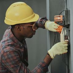 Man wearing a hard hat at work representing how paycheck protection insurance can safeguard your income during unexpected tragedies