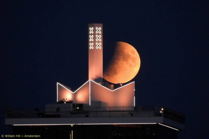 the moon and the Adam tower