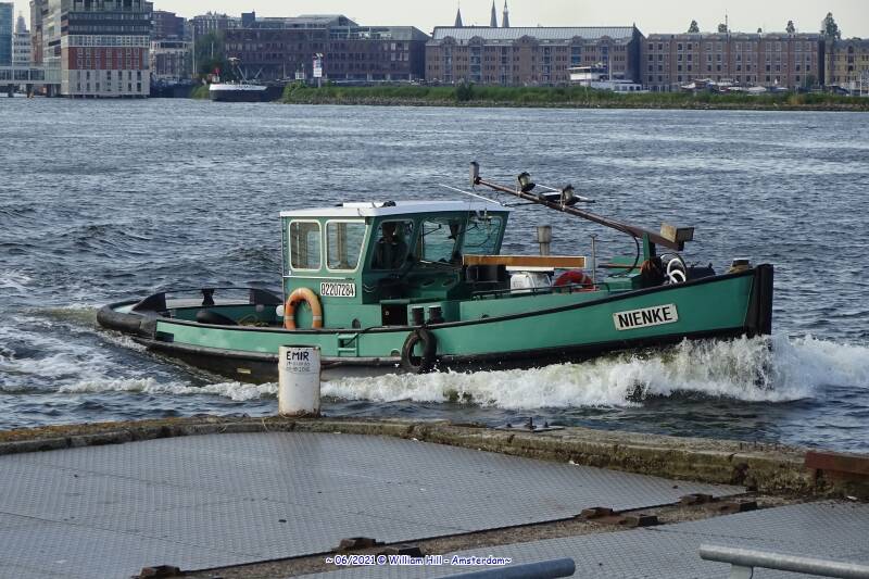 at NDSM pier, tug NIENKE passing