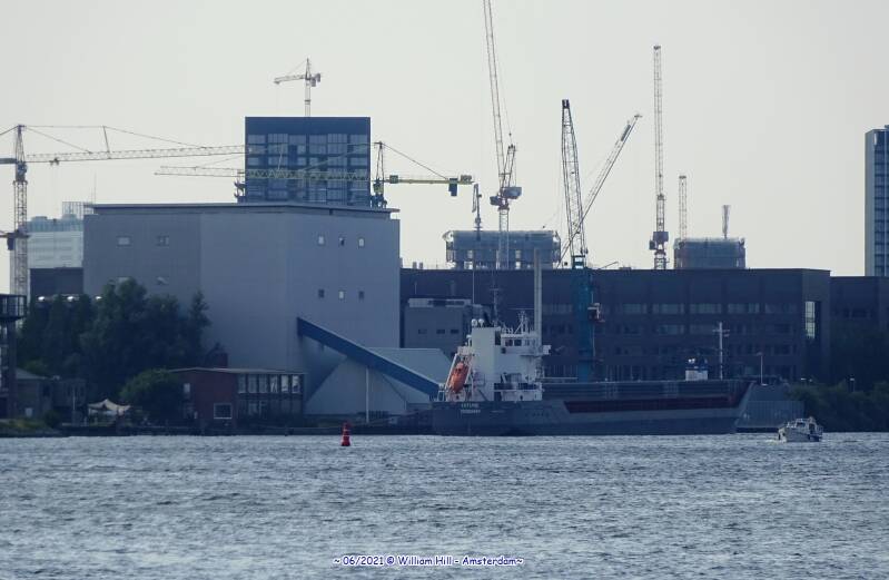 from NDSM pier, looking far left and I see in the foggy distance .. OMYA and coaster KVITSAND
