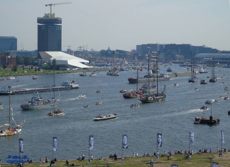overview with inlandships in convoy coming from eastside of the canal