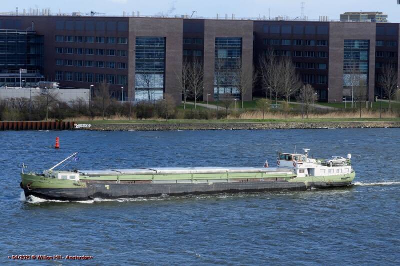 but still windy, we see little waves and cargo DORIA