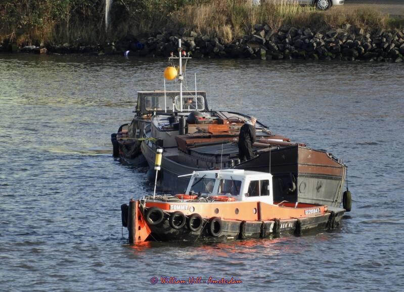 tug TOMMY with tow going right