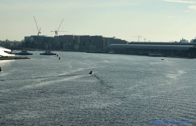 and there she goes over a wide IJ,  all alone in the centre like a pleasureboat