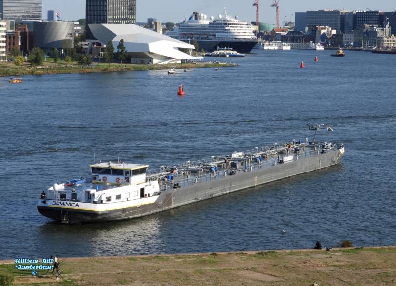 tanker 'DOMINICA' , waiting too for the cruiseship (they may not pass eachother behind the central station or same time at Stenenhoofd)