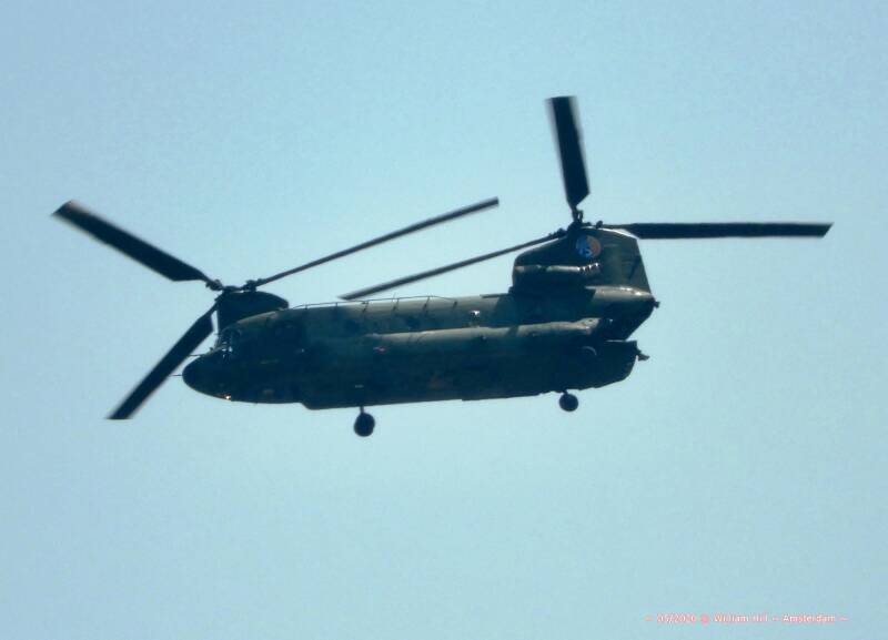 nice with open cargo door and a foot hanging out