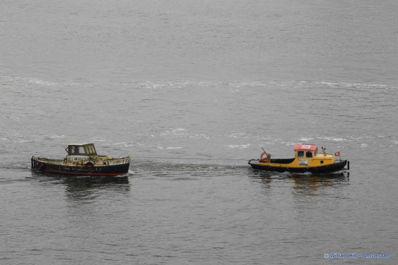 small tug with tow
