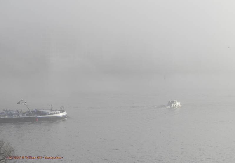 13:09, the fog is back and a pleasureboat is not looking and goes in front of an inl.tanker