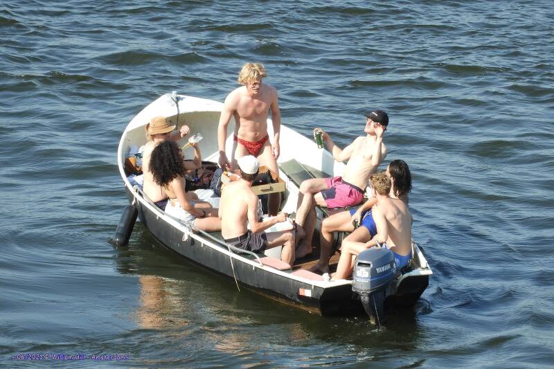 a lot of sausages and a bottle