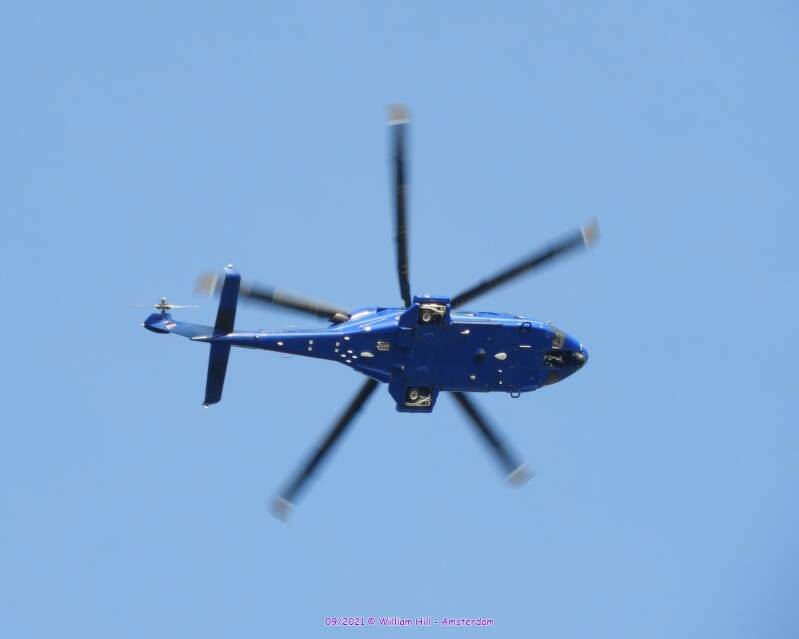 policehelicopter cricling around over her