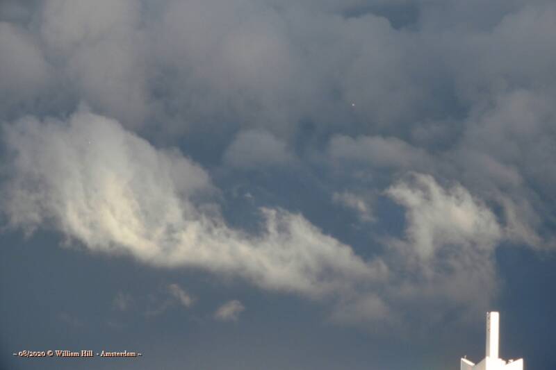 just clouds but what are these 2 lightballs?