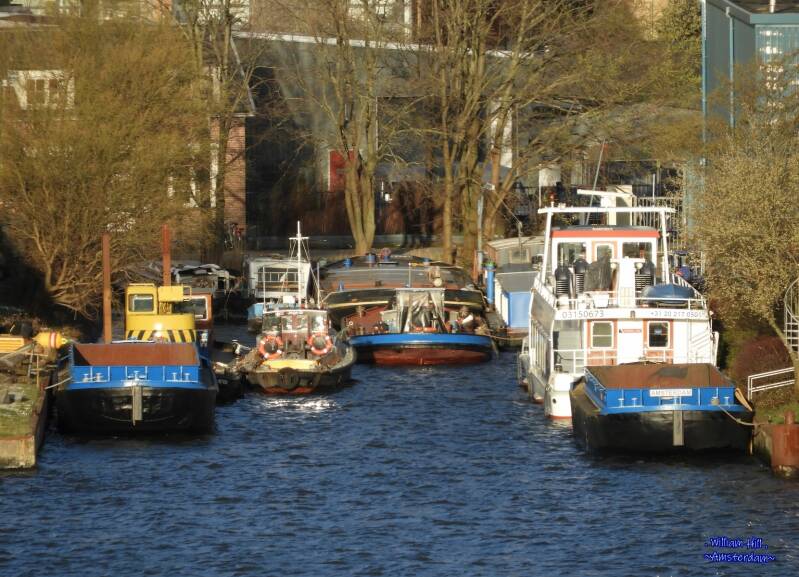 (17) - some ships in small harbor