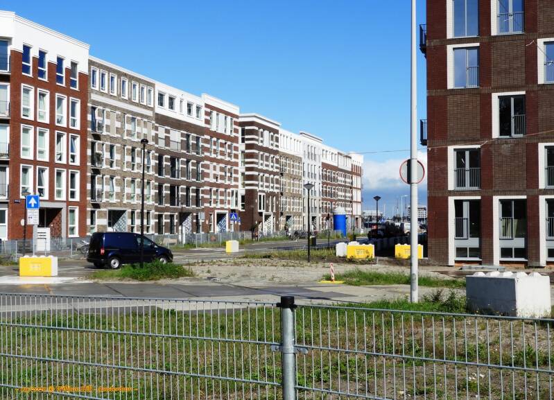 new streets and everywhere here we see the yellow/grey concrete blocks at corners and street entrances to keep out cars