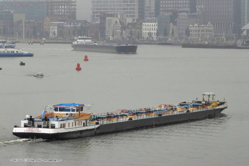 tanker LIBERTAS and from otherside in the fog, tanker MONFORD