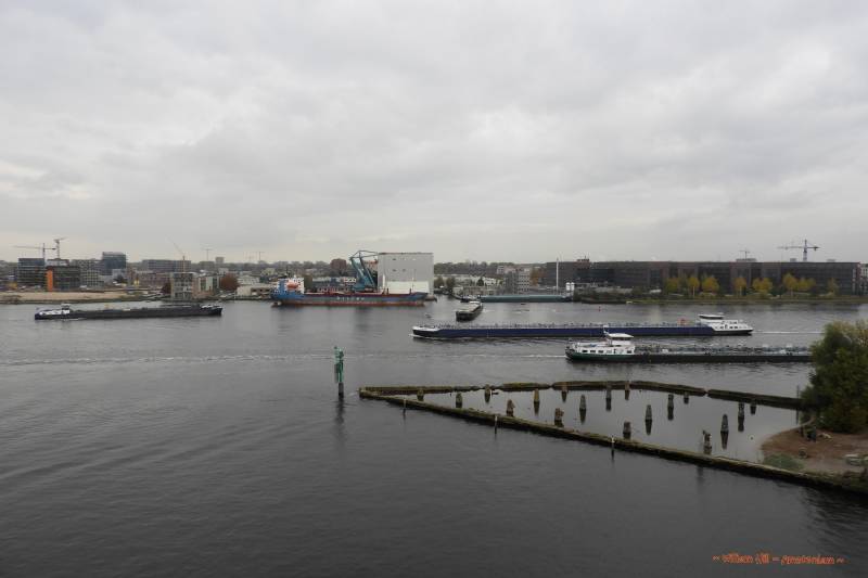 a busy moment when a cargo goes to park and a tanker arrives