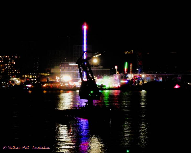 MAJA ENTERPRISE is ready and going to the next job, in the background the fair at NDSM