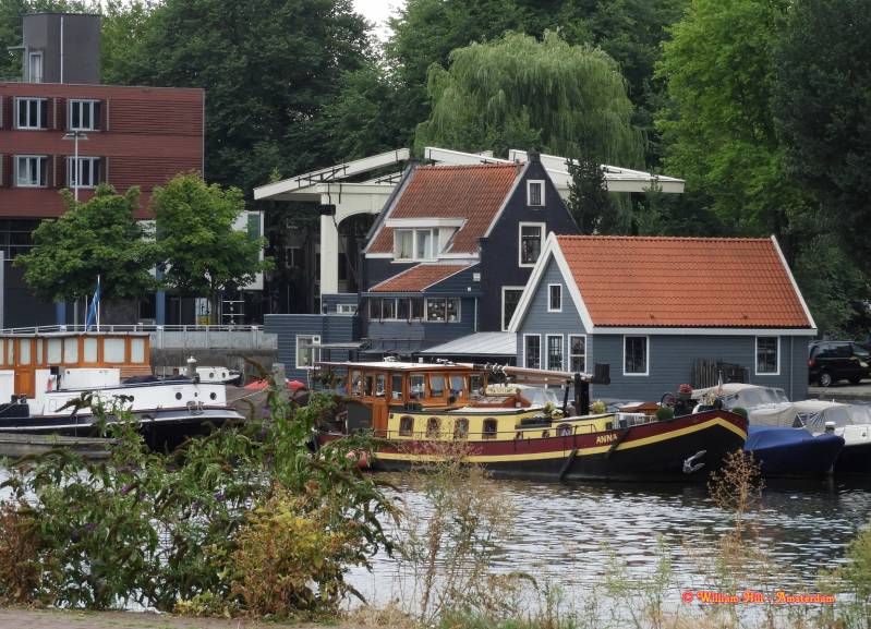 old bridge-operator cottage + boathouse at Westerdok