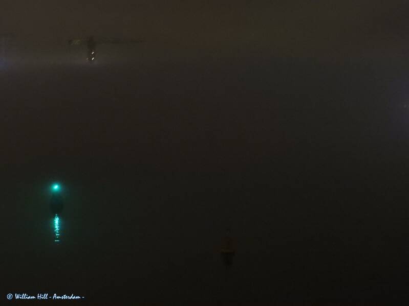 and behind that a wall of fog and a part of the old crane