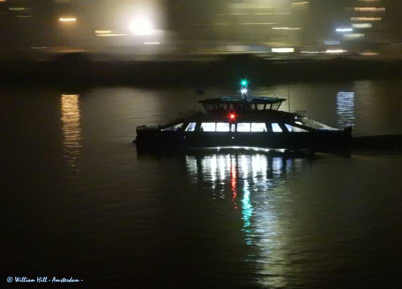 thanks to the fog on the land we see the passing ferry (IJveer 64) pretty nice