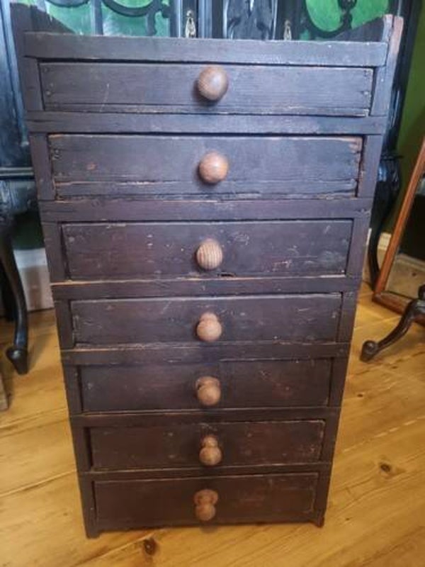 Antique watchmaker's or specimen Cabinet. dark-finished pine.