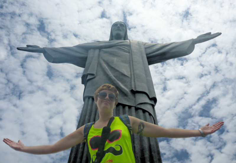 standing in front of jesus statue in rio de janeiro 