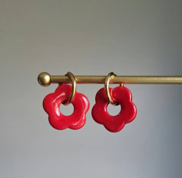 Stainless steel met grote rode bloem