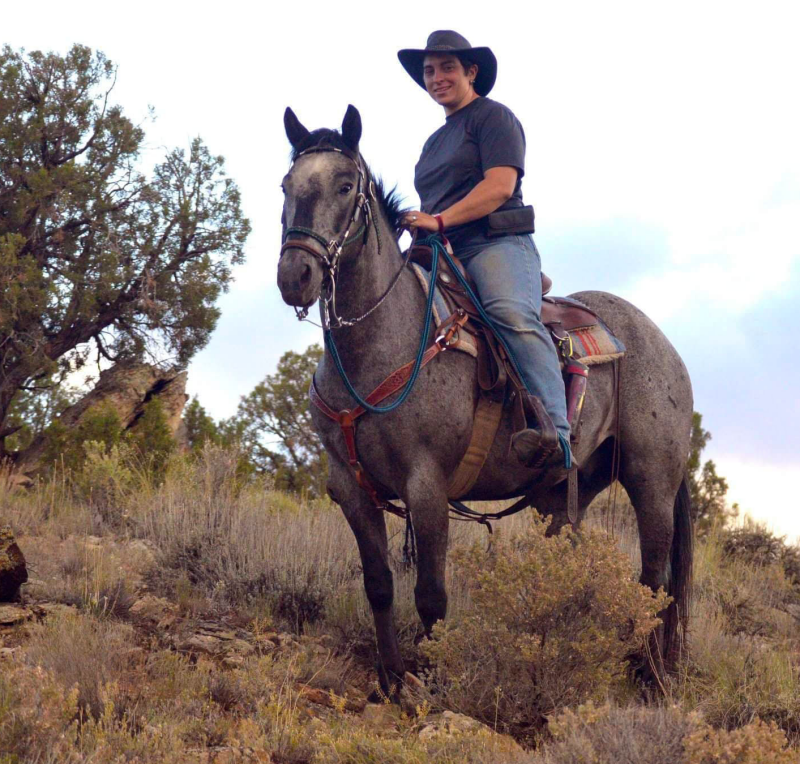 Photo of Gypsy on her horse, Taz