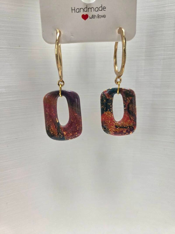Mooi multicolor oorbellen met een prachtige epoxy glans