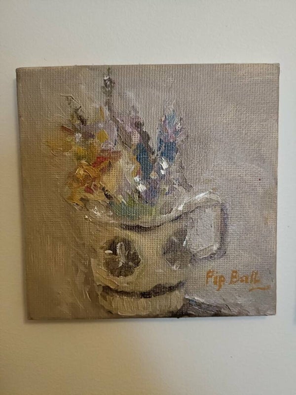 Miniature painting of mug and wildflowers