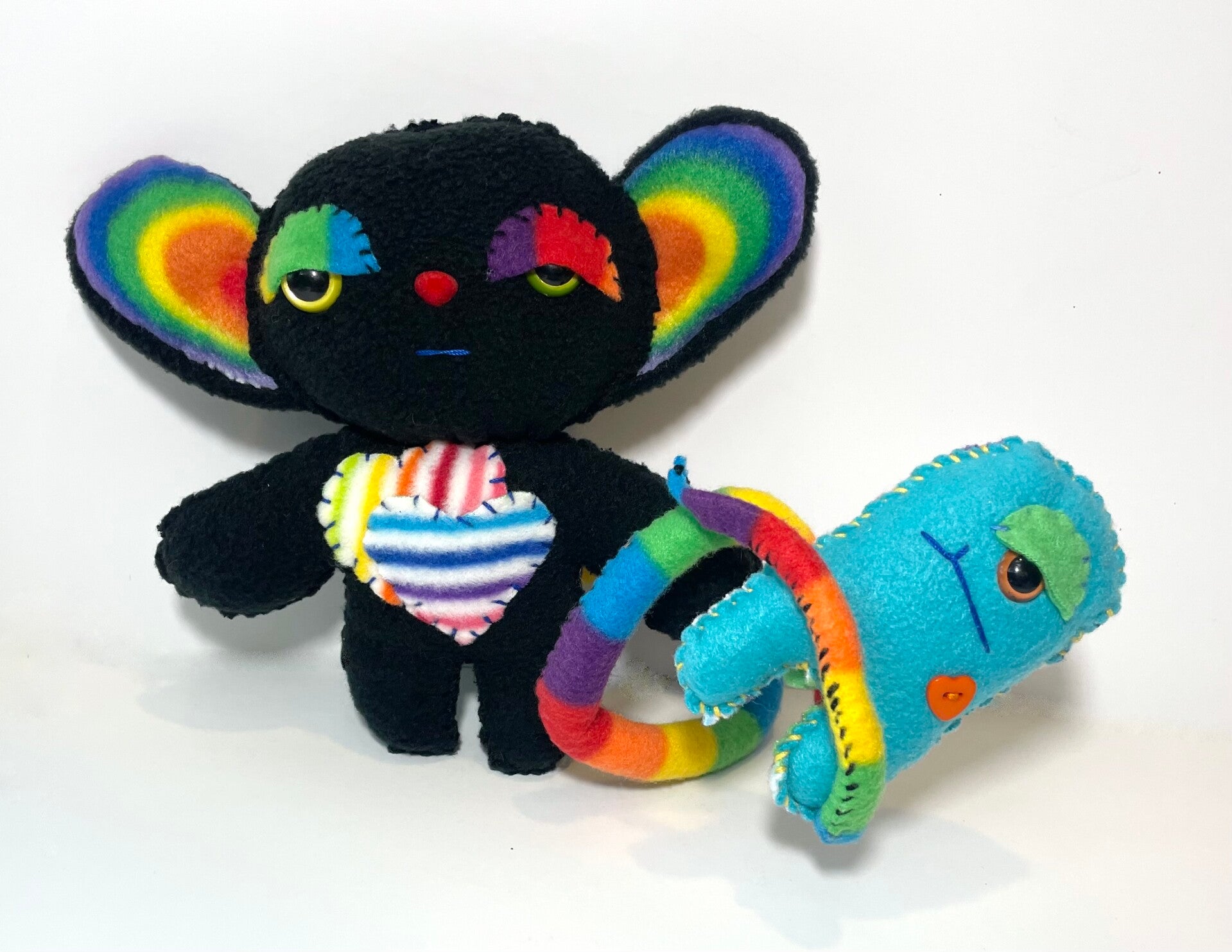 Colorful premade Homeless Monsters available for purchase.