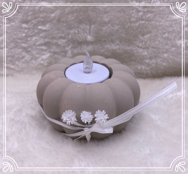 Kürbis mit Teelicht