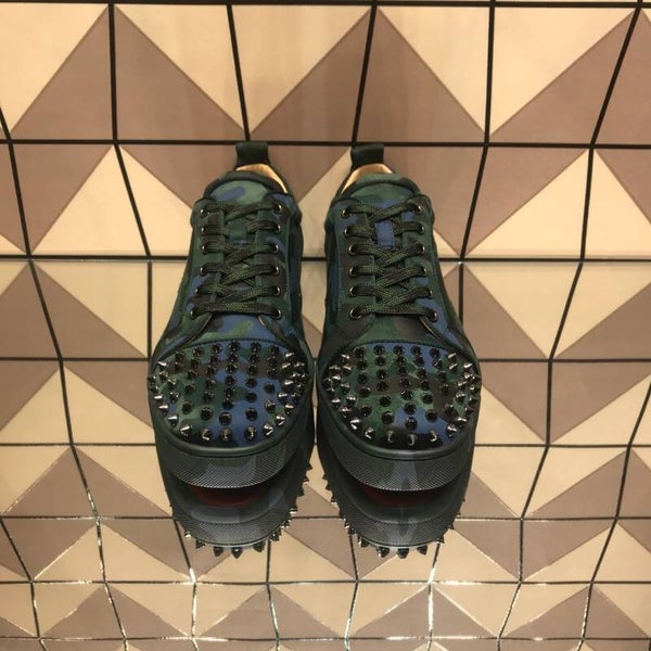 Christian Loboutin red bottom low top sneaker